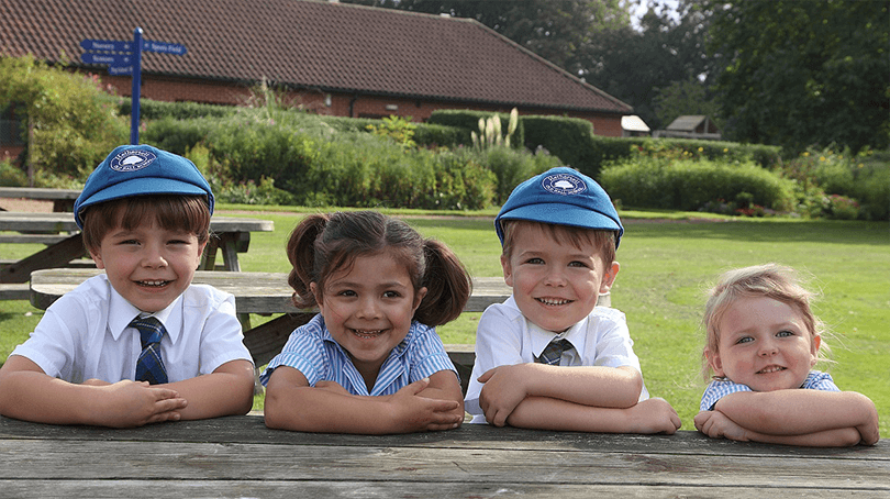 Young pupils in the garden