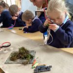 St. Christopher’s Prep School students contributing moss-inspired creations to the Mossy Carpet project.